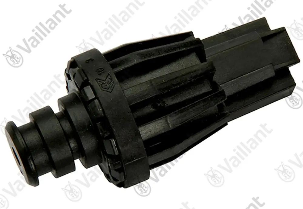 Schwarzes Bauteil von Vaillant mit mehreren vertikalen Rillen und einem länglichen Anschluss, wahrscheinlich ein Sensor oder Teil eines Druckentkopplungsmoduls.